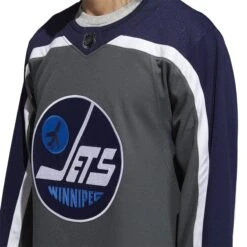 Winnipeg Jets Adidas Reverse Retro Authentic Senior Jersey 14 Winnipeg Jets Adidas Reverse Retro Authentic Senior Jersey -Baue Hockey Shop adidas nhl jerseys winnipeg jets adidas reverse retro authentic senior jersey navy 52 l 29271778132034