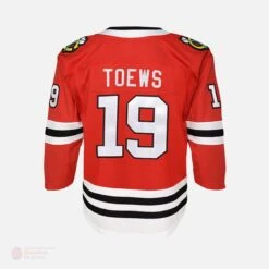 Chicago Blackhawks Home Outer Stuff Replica Junior Jersey - Jonathan Toews -Baue Hockey Shop outer stuff nhl jerseys chicago blackhawks home outer stuff replica junior jersey jonathan toews 14656160628802